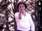Virginia holding gun on Bernice